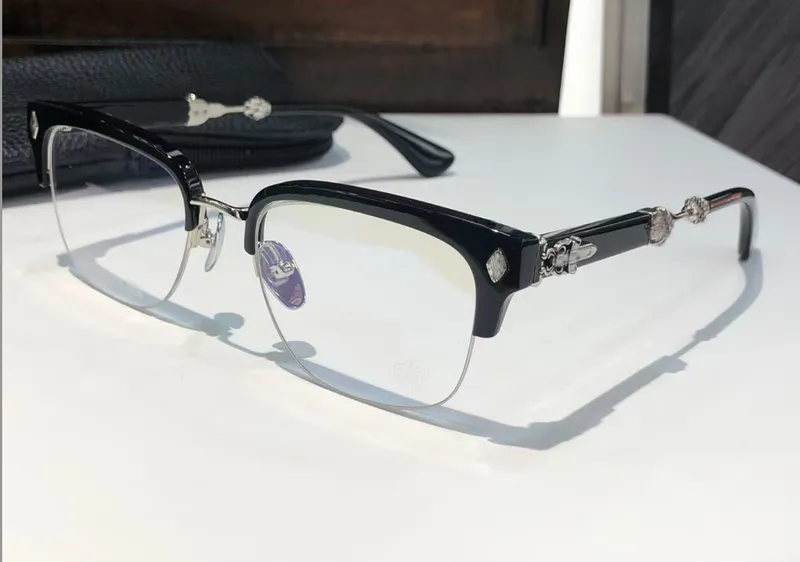 Titanium anteojos plateados negros negros tirón lente transparente hombres de gafas de sol de moda con caja